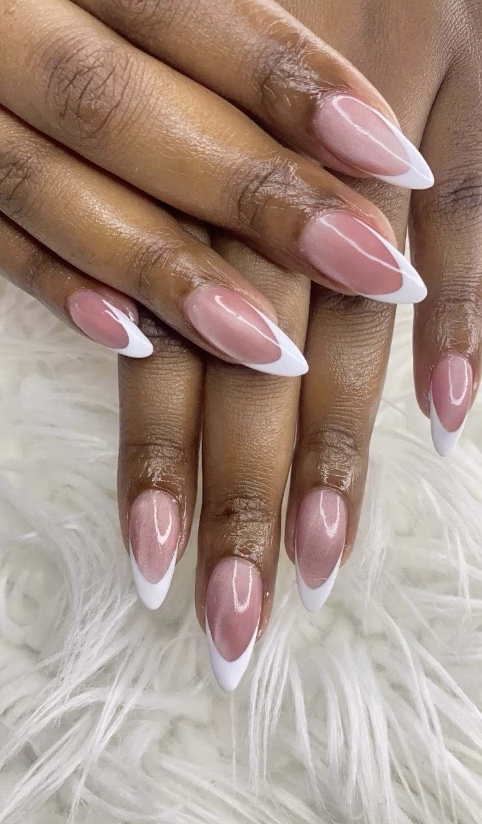 Classic French set — almond shaped nails with crisp white tips