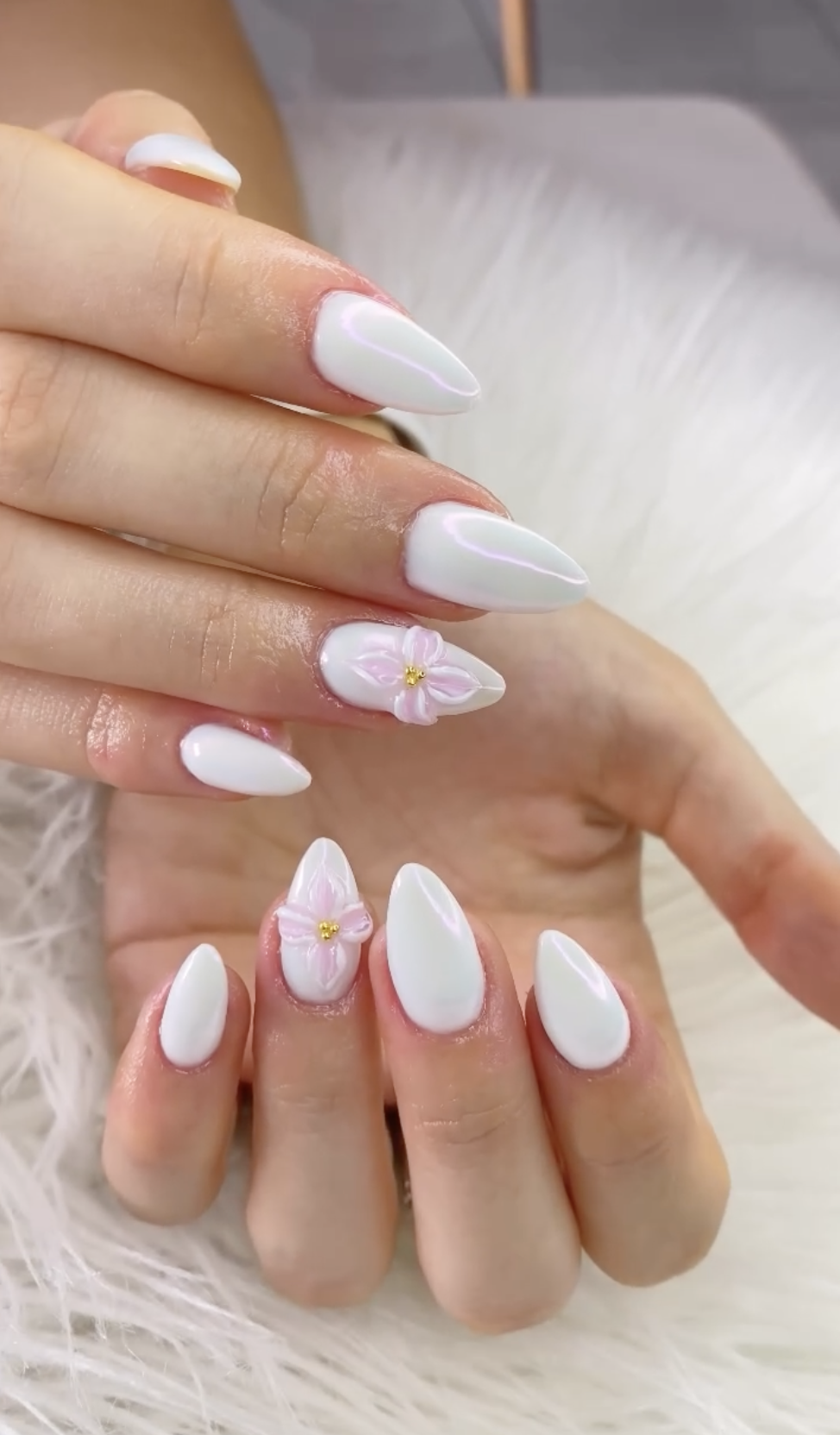 White nails with 3D pink flower nail art